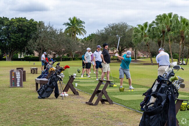 A group of friends enjoying a beautiful afternoon at Jacaranda Golf Club in Sunshine Village.