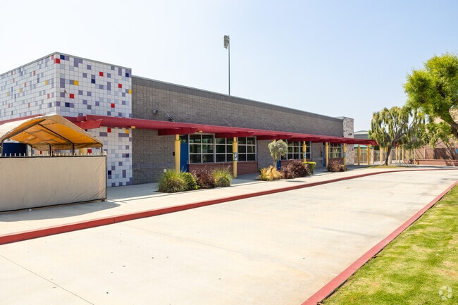 Juan De Anza Elementary School in Hawthorne, CA has bright colored buildings on campus.