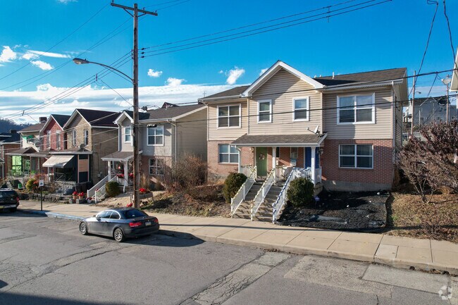 Some streets in Braddock have ample sidewalks perfect for an evening stroll.