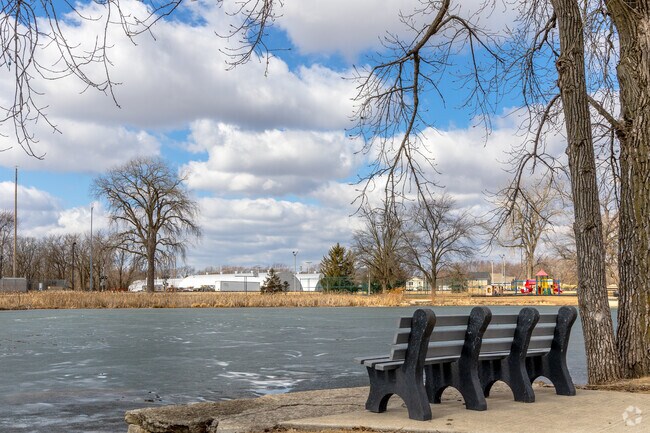 Manhattan residents take in the serene surroundings at Central Park.