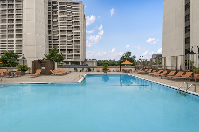 Sparkling Pool with Expansive Sundeck and Tanning Areas