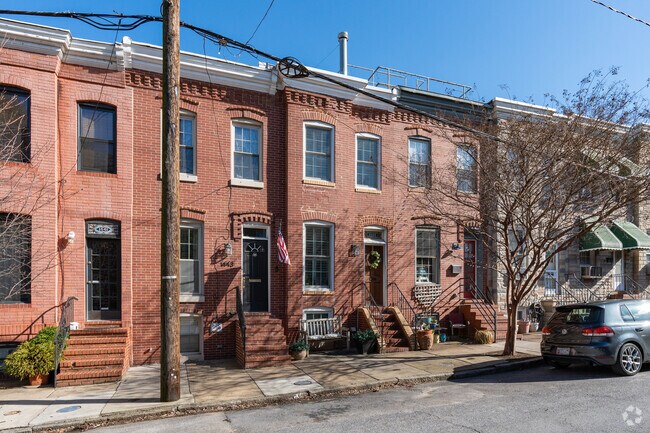 Here is a renovated historical row of brick homes in Locust Point.