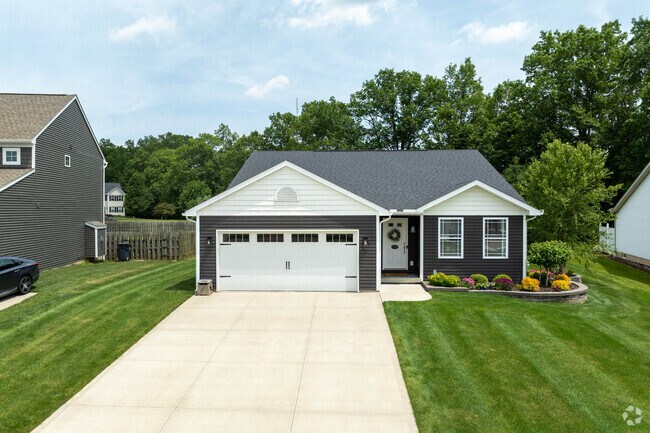 A modern ranch situated in a new development in Brimfield.
