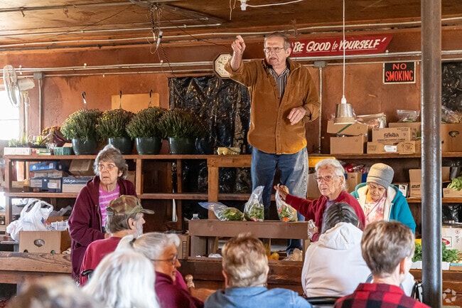 Auctioneers at the weekly Belleville Livestock Market sell produce, livestock and farm goods.