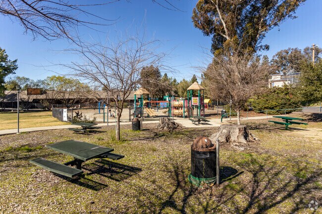 The Alpine neighborhood community center features a playground and tennis court.