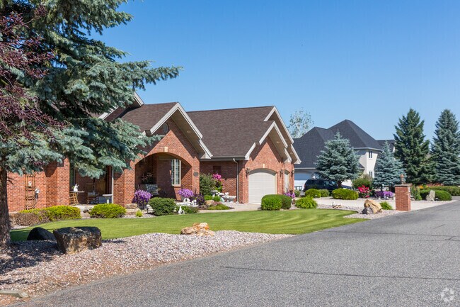 East Helena Valley ranch houses on a quiet street at the Fox Ridge Golf Course.