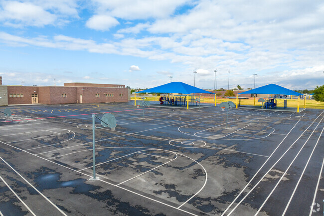 Addeliar Guy Elementary School's students engage in enriching activities like sports and arts.