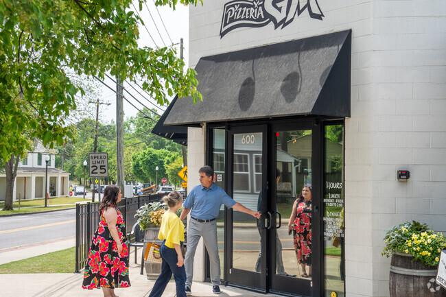 Grab some delicious pizza at Pizzeria G.M. near Hillman.
