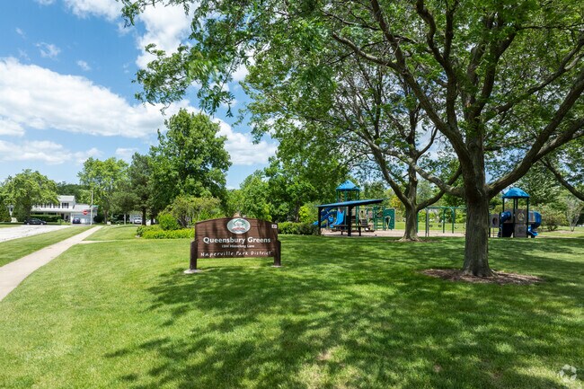 Queensbury Greens has ample shade alongside a large grass field.