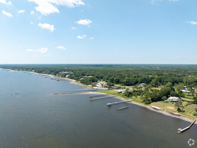Wooden piers and forested lots define Lanark Village on Florida’s Forgotten Coast.