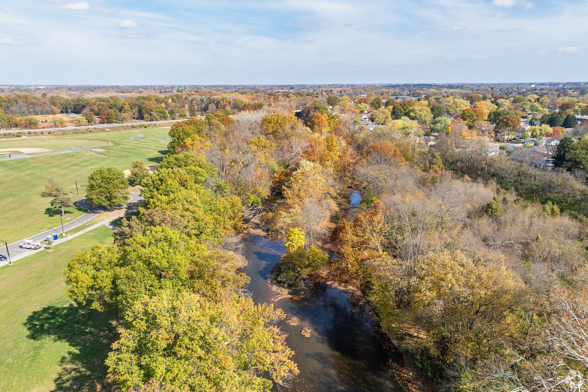 Big Walnut Creek forms the western border of the Pine Hills neighborhood.