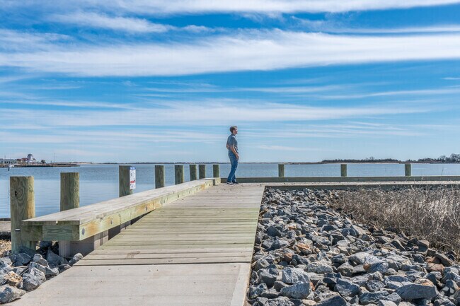 Visitors enjoy the view of Moriches Bay from a dock in East Moriches.