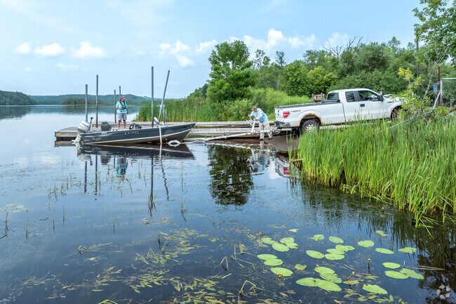 A couple loads their boat up after a morning outing on the St. Louis River in Gary New Duluth.