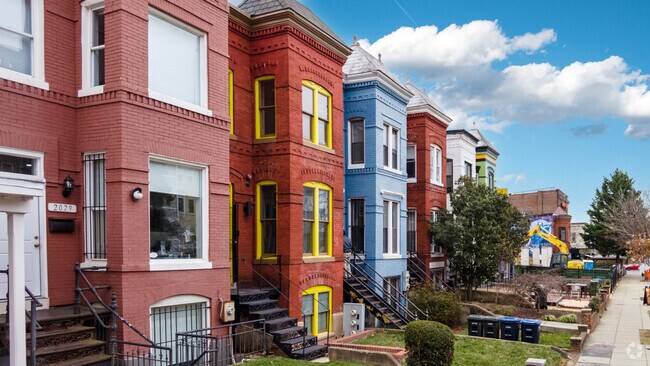 Colorful and coveted U Street townhomes are bigger inside than they look.