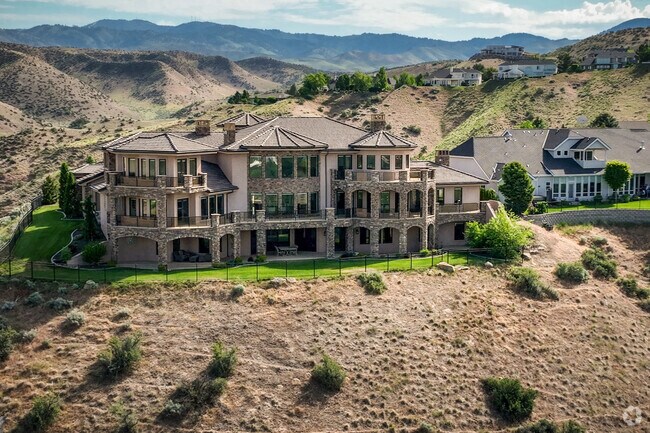 Single story entrances of homes in the Foothills give way to breathtaking backyard views of the Boise valley below.