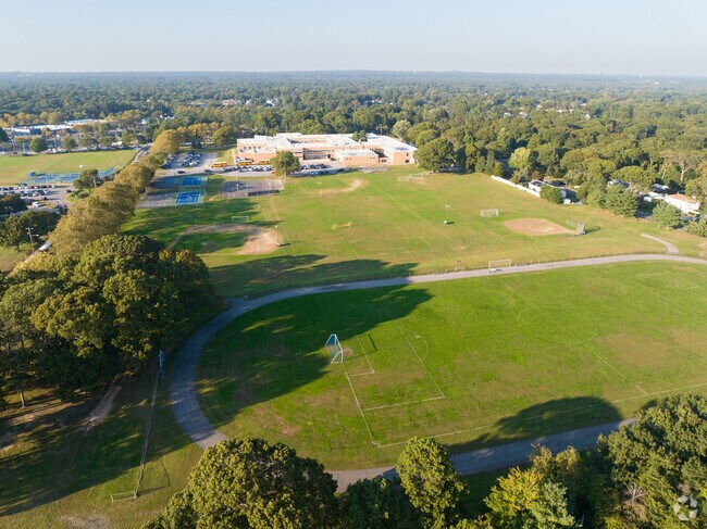 NID507906 Happague Middle School sits right next to Happague High School in a busy neighborhood.