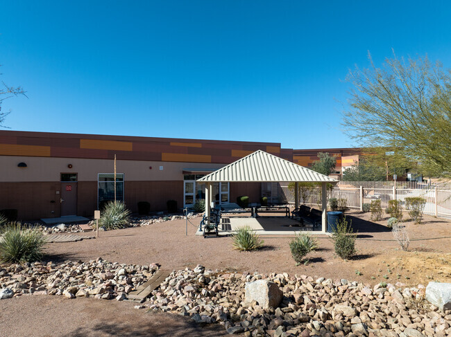 There are shaded outdoor spaces for kids to learn at inInnovation Academy in Tucson, Arizona