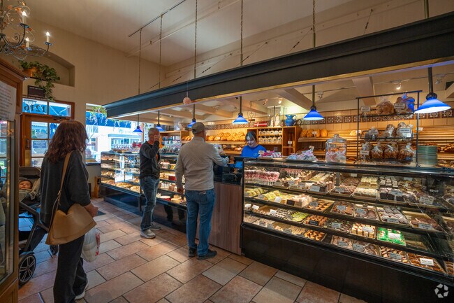 People enjoying fresh pastries at Copenhagen Bakery in Burlingame Gardens.