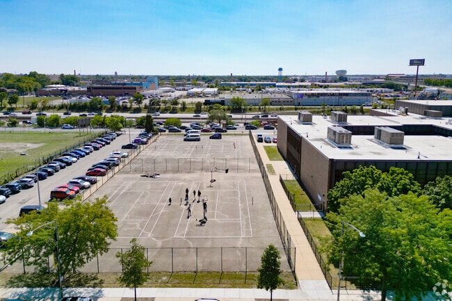 Students play basketball in the courtyard at Michele Clark Academic Prep Magnet High School.