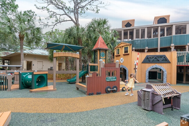 Laugh and play in the vibrant recreational spaces of Sugar Sand Park.