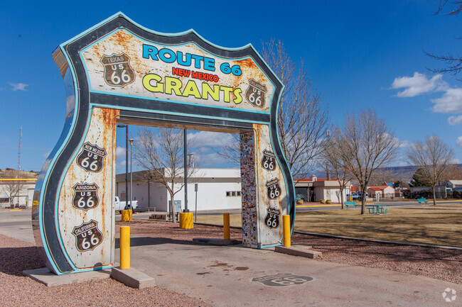Locals and tourists enjoy brining their car to the drive thru Route 66 sign in Grants.