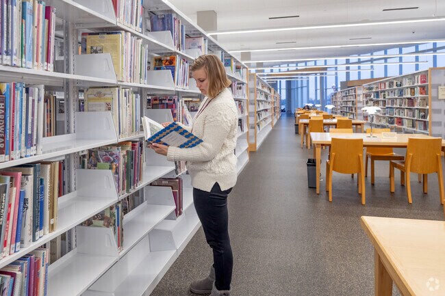 The Great River Regional Library near Colonial Gardens is the largest in the region.