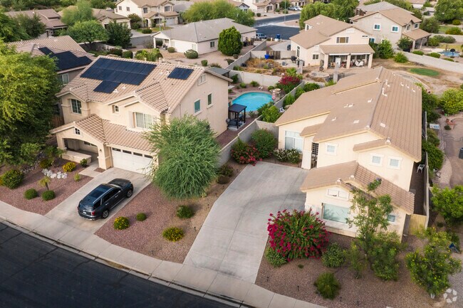 Many homes in the Sun Groves offer solar panels on the roof and pools in the backyard.