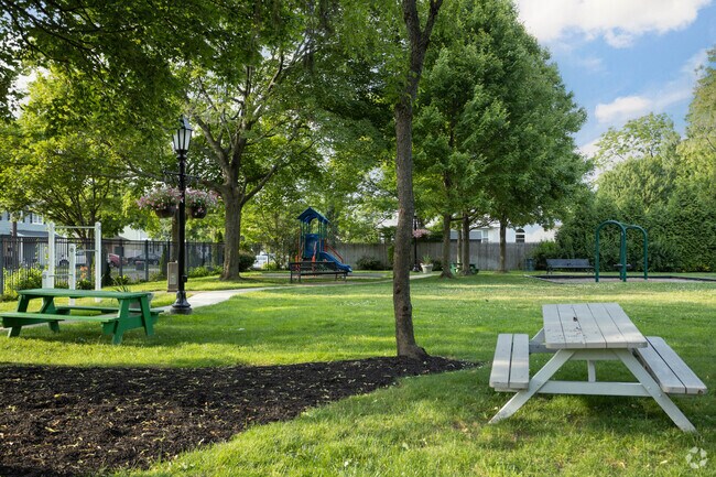 Sit in the shade at the Emil Gerngras Park in Farmingdale.