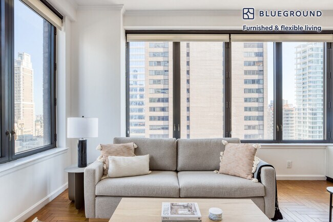 150 E 57th St unit FL32-ID915, New York, NY 10022 - photo 2