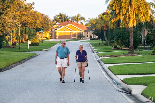 Village of Largo residents often take walks through the streets of their neighborhood.