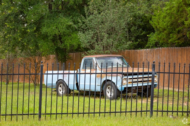 Old cars and large yards give Hudson Bend much of its personality.