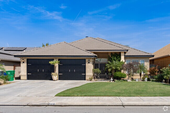 A beautiful large home with iron gate entrance in Parkview Estates.