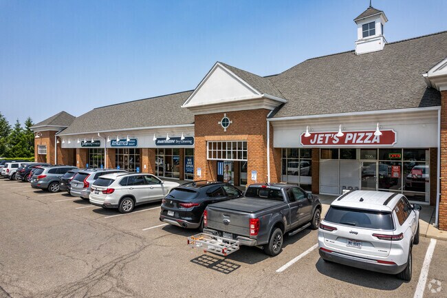 Jets Pizza is located just around the corner from Kroger off of Hampstead Village Center Way.
