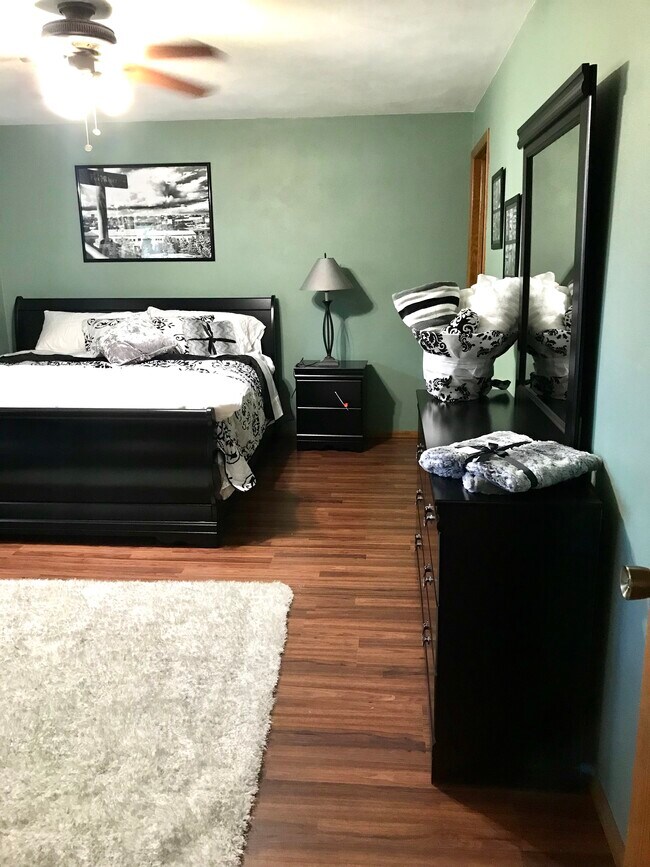 Luxury king sleigh bed, lots of dresser space and your own private half bath.