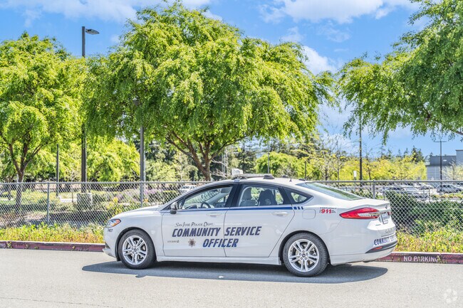 A community Service Officer vehicle is parked along a street in Silver Leaf.