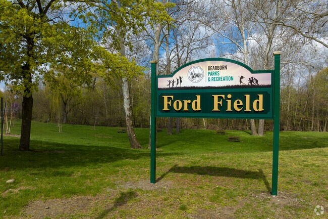 The sign at Ford Field Park welcomes Dearborn Hills joggers and bikers.