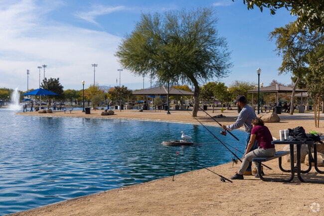 Residents fish at the Surprise Community Park lake.