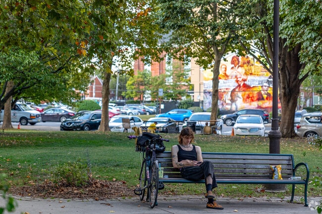Take a breather on a park bench in Jefferson Square on your commute home from work.