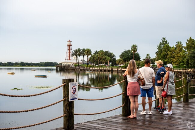 Village of Bridgeport families enjoy the views of Lake Sumter after a full day of activities.