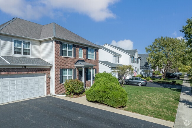 Quiet tree-lined streets and well-maintained yards define Sunset Park-Old Plank.