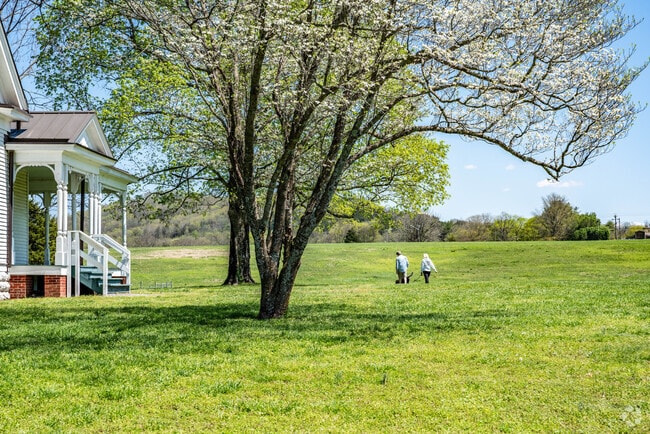 People Walking Their Dog in the Park in Harlinsdale Farm in the Downtown Franklin Neighborhood.