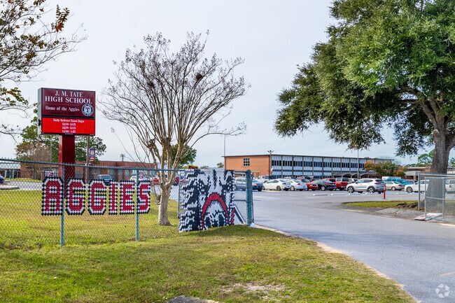 JM Tate Senior High School offers career academies and college prep programs.