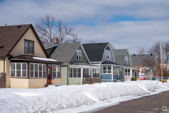 Craftsman bungalows with enclosed porches line the historic streets of Standish.