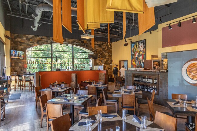 Residents can peruse the lengthy craft cocktail menu at Five-O-Three.