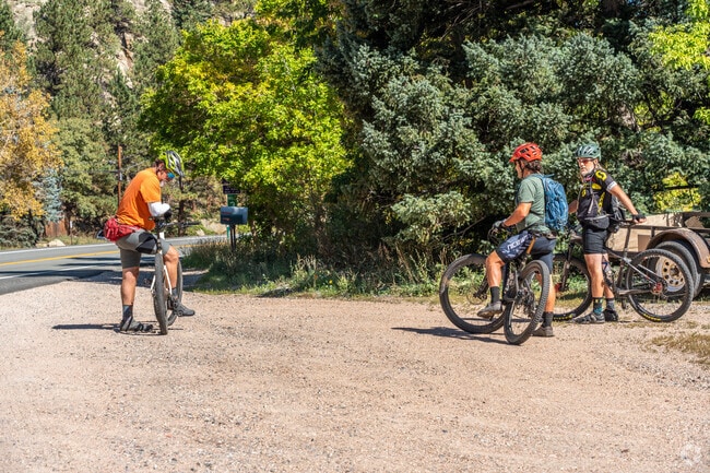 Cycling enthusiasts in Mountain Meadows enjoy the exhilarating bike trails.