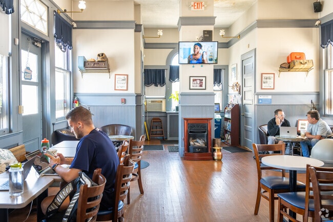 Sip on a fresh brew from Mystic Depot Roaster at Mystic Amtrak Station, CT.