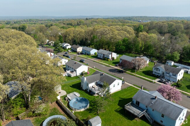 Hamden has homes tucked away from the surrounding big cities.