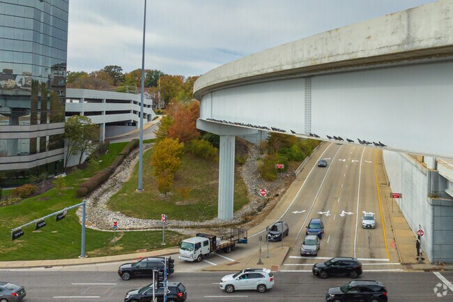 Brentwood pigeons stand guard on bridge over Brentwood Avenue.