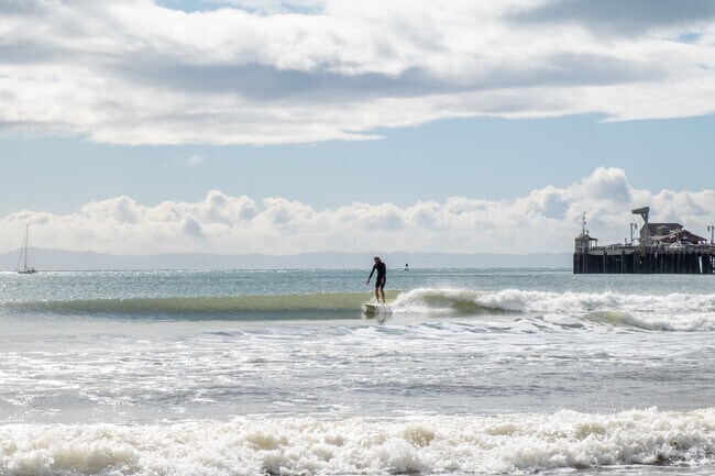 Locals head to East Beach to surf a good beach break.