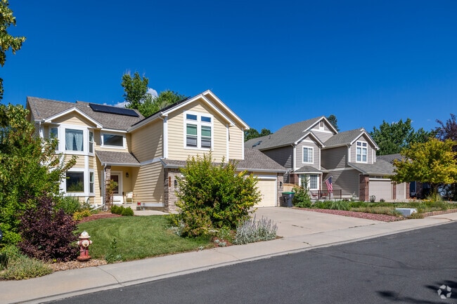 Explore a row of midcentury traditional style homes in Longmont Estates.